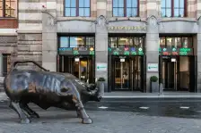 AEX indicatie is vlak en de dollar is sterk